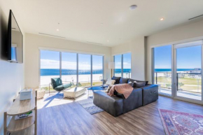 Luxury 4 BR Beachfront Condo with Rooftop Pool Next to the Hangout! GP 303